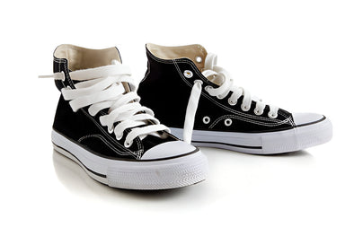 a white and black color sneaker in image